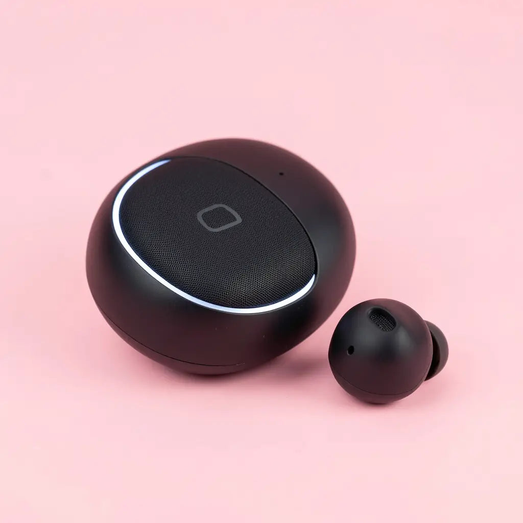 Black wireless earbuds with charging case on a pink background